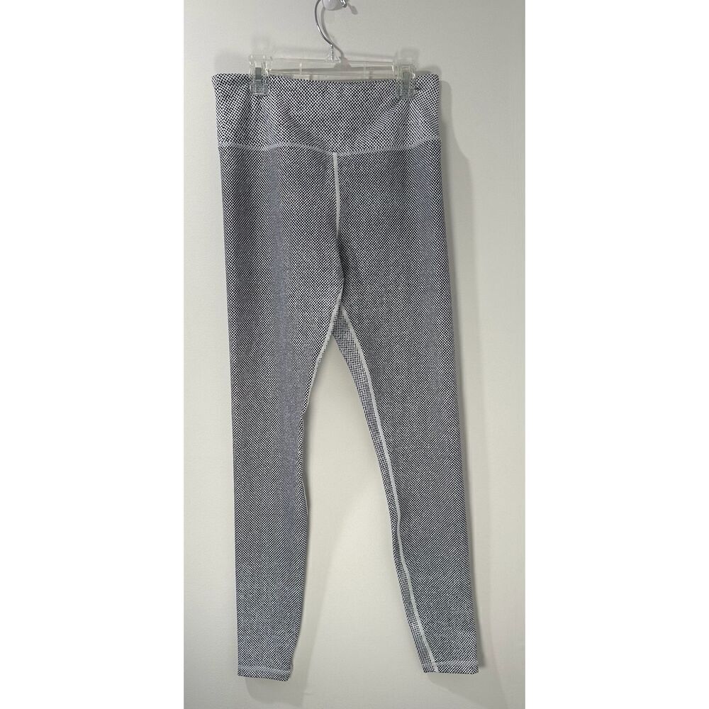 Zyia Active blue white dot pattern women’s leggings size 8/10. #31-1809